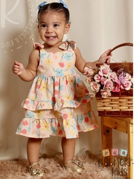 vestido floral com babados e amarração nas mangas