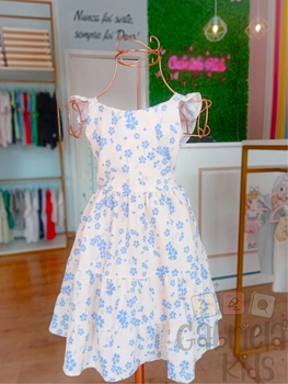 vestido floral azul,aberta nas costas com amarração .